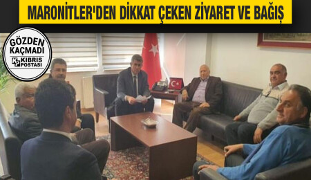 Topladıkları bağışı Büyükelçi'ye takdim ettiler