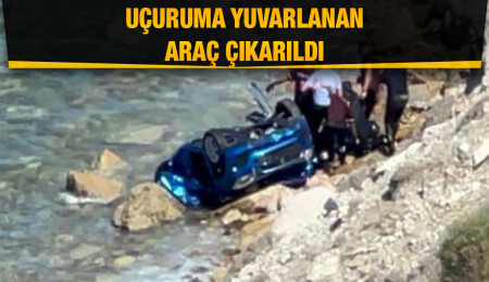 Geçitköy - Kayalar yolunda uçuruma yuvarlanan araç çıkartıldı