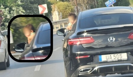 Küçük çocuk seyir halindeki araçtan sarktı: Boğaz-Girne yolunda yürekleri ağza getiren anlar