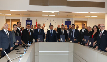 DAÜ’nün sürdürülebilir mali yapıya kavuşturulmasına ilişkin protokol Başbakan Üstel şahitliğinde imzalandı