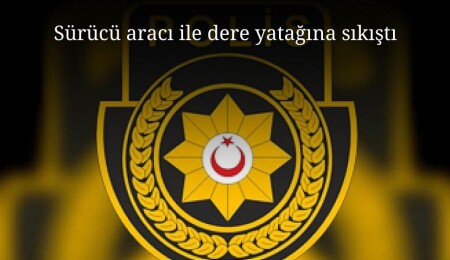 Sürücü aracı ile suya kapılarak dere yatağına sıkıştı