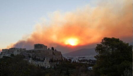 One Dead as Greek Wildfire Eases in Athens Suburbs, but High Winds Expected